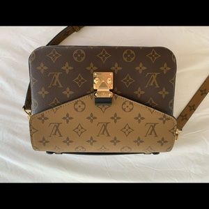 Louis Vuitton pouchette Métis